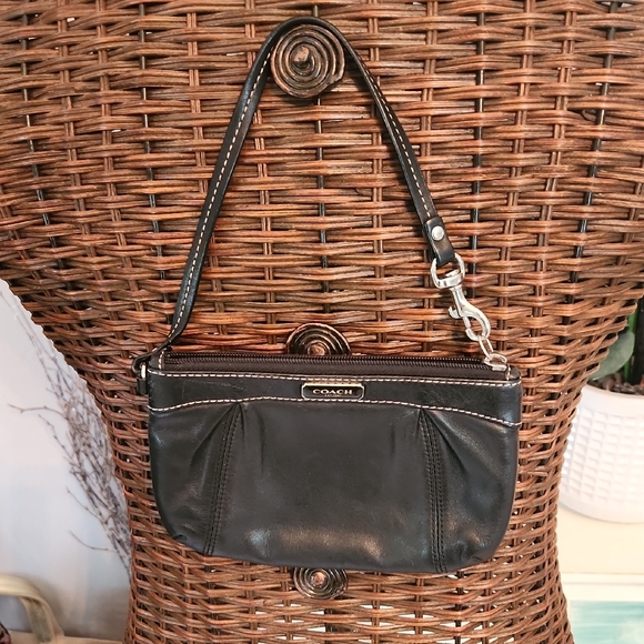 Coach Handbags - Coach Black Leather Clutch with Pleated Design